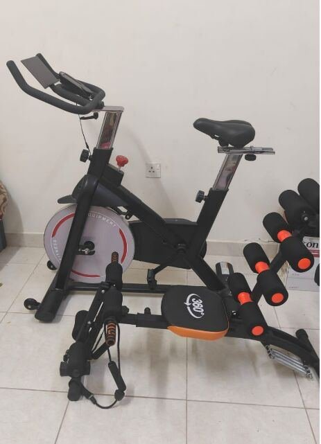 SAR 525, Compact Home Gym Combo: Spin Bike + Ab Machine In One Space‑saving Setup, Perfect For Full