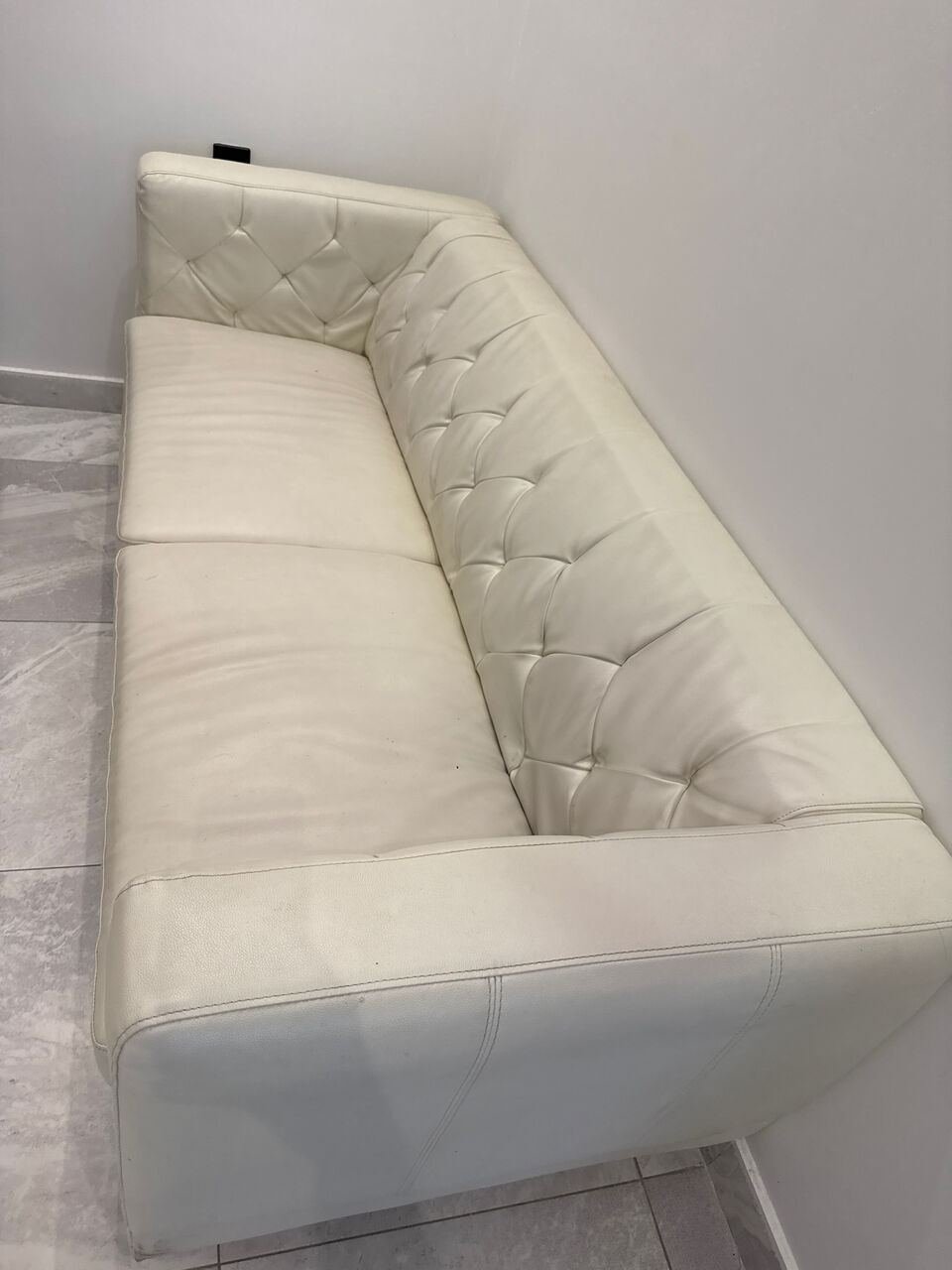 SAR 400, Two Single Yellow Sofa And One Three Seater White Sofa -Home Centre Product